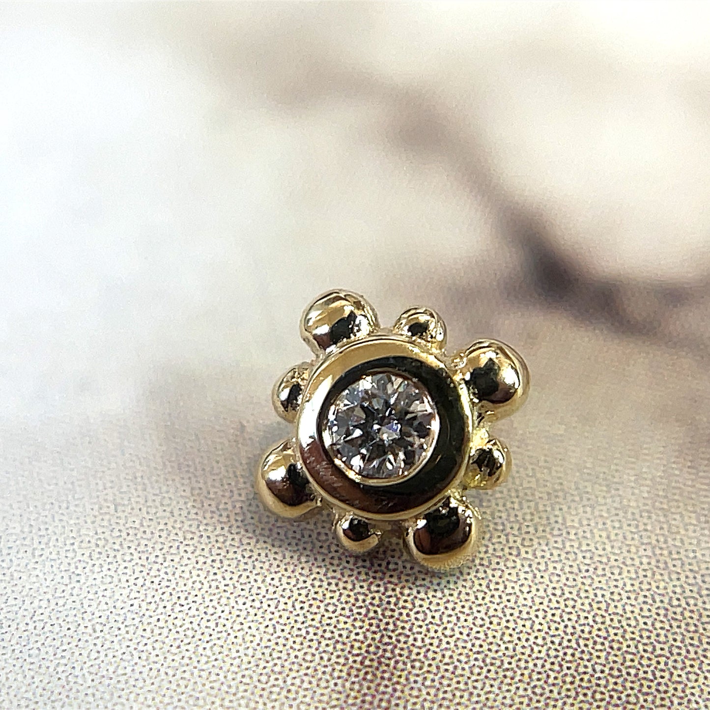 Round Bezel Surrounded by 8 Beads